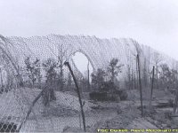 RPG Puts Hole in the Fence - At  FSB Burkett just before May 70 Cambodian Invasion.  RMcDonald Photo